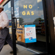 A customer walks out of an Exxon filling station and convenience store where a sign on the door reads “No Gas,” Thursday, Aug. 31, 2017, in Bedford, Texas. It’s getting harder to fill gas tanks in parts of Texas where some stations are out of fuel and pump costs are spiking. A major gasoline pipeline shuttered due to Harvey may be able to resume shipping fuel from the Houston area by Sunday, which could ease gasoline shortages across the southern U.S. (AP Photo/Tony Gutierrez)